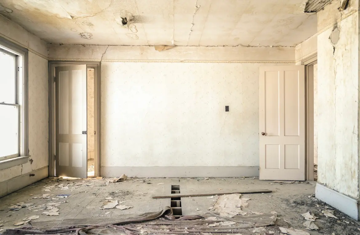 Waste disposal crew managing a cleanout project in East Grand Rapids