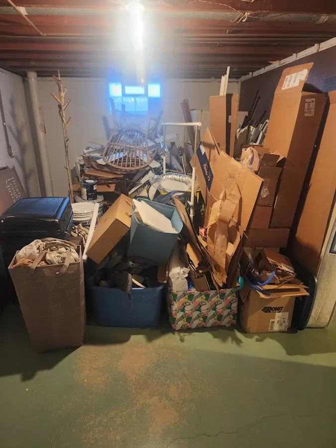 Roll-off dumpster container at job site for 4 Yard Dumpster Rental in East Grand Rapids